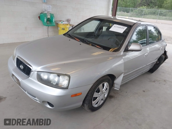 2002 Hyundai Elantra GLS z VIN KMHDN45D52U340239, wystawiony jako IAAI lot #42260604 z przebiegiem 288 297 mil mil oraz . Historia ofert i sprzedaży dostępna na DreamBid. Obrazek 18.