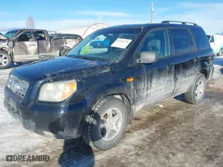 2006 Honda Pilot EX-L with VIN 2HKYF18536H526013, listed as a IAAI auction lot 41335771 with 223,265 mi miles. Bid and sale history available at carsss.com. Image 17.