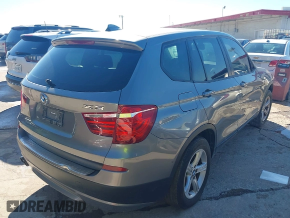 2011 BMW X3 28i with VIN 5UXWX5C52BL707952, listed as a IAAI auction lot 42213828 with 131,519 mi miles and . Bid and sale history available at DreamBid. Image 4.