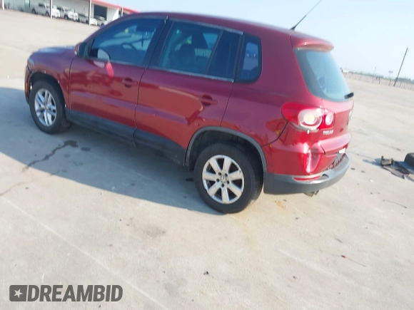 2011 Volkswagen Tiguan SEL w/Premium Navi with VIN WVGAV7AX4BW001402, listed as a IAAI auction lot 42406619 with 183,035 mi miles and . Bid and sale history available at DreamBid. Image 3.