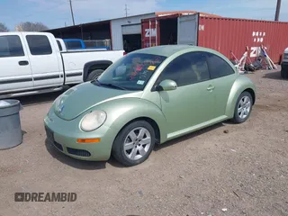 2007 Volkswagen New Beetle Coupe with VIN 3VWPW31C67M521767, listed as a IAAI auction lot 41687893 with 148,312 mi miles. Bid and sale history available at carsss.com. Image 2.
