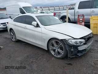 2016 BMW 4 Series 428i xDrive with VIN WBA4C9C54GG135615, listed as a IAAI auction lot 41655368 with 156,851 mi miles and . Bid and sale history available at carsss.com. Image 1.