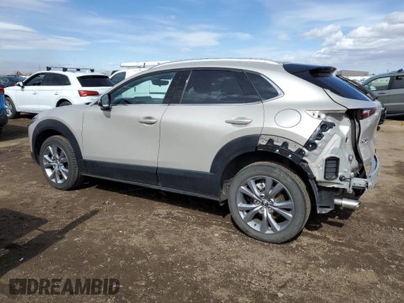 2022 Mazda CX-30 S Premium with VIN 3MVDMBDL4NM447276, listed as a Copart auction lot 47527985 with 4,577 mi miles and Salvage Title. Bid and sale history available at carsss.com. Image 2.