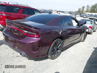 2021 Dodge Charger GT with VIN 2C3CDXHG4MH667025, listed as a IAAI auction lot 41602696 with 77,503 mi miles and . Bid and sale history available at DreamBid. Image 4.