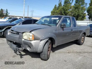 2003 Nissan Frontier XE with VIN 1N6DD26T63C454580, listed as a Copart auction lot 49132485 with 310,840 mi miles and Salvage title. Bid and sale history available at DreamBid. Image 1.