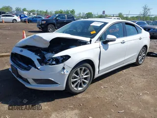 2017 Ford Fusion SE z VIN 3FA6P0H7XHR415299, wystawiony jako IAAI lot #42232634 z przebiegiem 107 962 mil mil oraz . Historia ofert i sprzedaży dostępna na DreamBid. Obrazek 16.