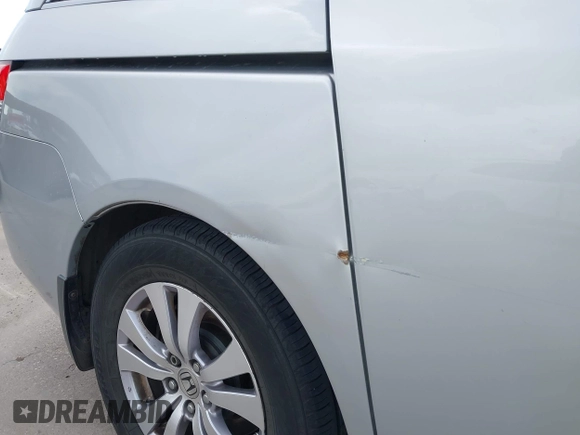 2014 Honda Odyssey EX-L with VIN 5FNRL5H60EB058753, listed as a IAAI auction lot 42595221 with 194,995 mi miles and . Bid and sale history available at DreamBid. Image 21.