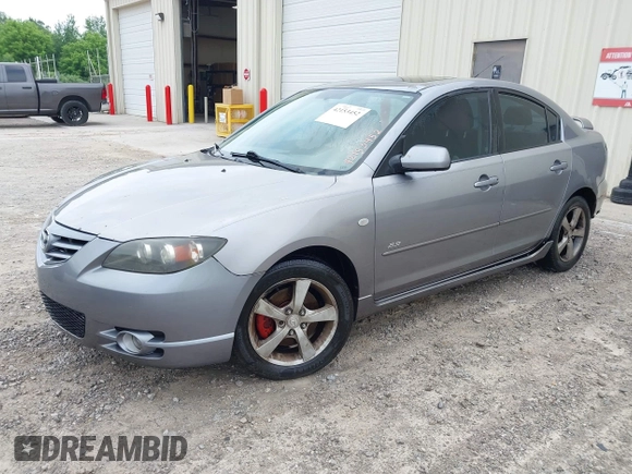 2005 Mazda 3 s with VIN JM1BK123551254112, listed as a IAAI auction lot 42153452 with 258,826 mi miles and . Bid and sale history available at DreamBid. Image 2.