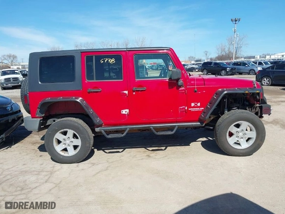2008 Jeep Wrangler Unlimited X with VIN 1J4GA39188L619460, listed as a IAAI auction lot 41745778 with 199,799 mi miles. Bid and sale history available at carsss.com. Image 13.