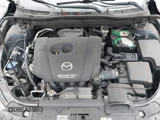2015 Mazda 3 i Grand Touring with VIN 3MZBM1W78FM219833, listed as a IAAI auction lot 41578872 with 61,138 mi miles and . Bid and sale history available at DreamBid. Image 10.