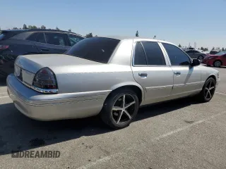 2004 Ford Crown Victoria LX с VIN 2FAFP74W44X184918, выставлен на аукционе Copart как лот 73346744 с пробегом 157 925 миль миль и Списание • Salvage title. История ставок и продаж доступна на DreamBid. Изображение 3.