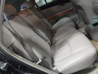 2007 Lexus RX 400h z VIN JTJGW31U172001122, wystawiony jako IAAI lot #42335831 z przebiegiem 232 699 mil mil oraz . Historia ofert i sprzedaży dostępna na DreamBid. Obrazek 8.