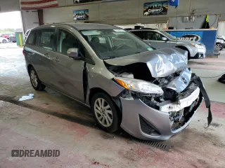 2015 Mazda 5 Sport z VIN JM1CW2BL3F0181621, wystawiony jako Copart lot #57063715 z przebiegiem 95 104 mil mil oraz Szkoda całkowita • Salvage title. Historia ofert i sprzedaży dostępna na DreamBid. Obrazek 4.