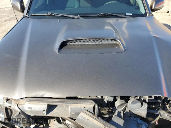 2010 Toyota Tacoma PreRunner with VIN 3TMKU4HN3AM025218, listed as a Copart auction lot 87600035 with 92,605 mi miles and Salvage title. Bid and sale history available at DreamBid. Image 11.