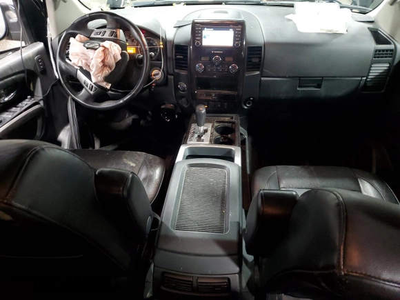2015 Nissan Titan SV with VIN 1N6AA0EC9FN510828, listed as a Copart auction lot 43855205 with 63,512 mi miles and Salvage title. Bid and sale history available at DreamBid. Image 8.