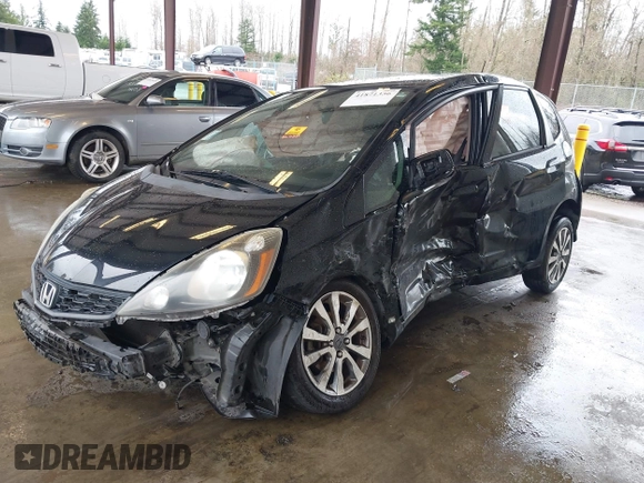 2013 Honda Fit Sport with VIN JHMGE8H57DC033384, listed as a IAAI auction lot 41871356 with 150,777 mi miles. Bid and sale history available at carsss.com. Image 16.
