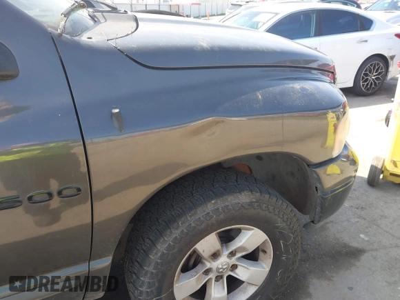 2002 Dodge 1500 with VIN 1D7HU18NX2S607033, listed as a IAAI auction lot 41644160 with 143,736 mi miles and . Bid and sale history available at DreamBid. Image 12.
