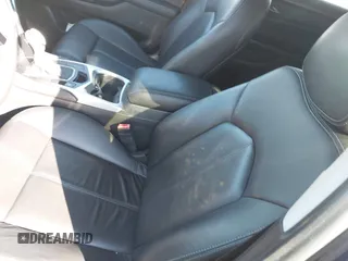 2015 Cadillac SRX with VIN 3GYFNAE35FS608595, listed as a IAAI auction lot 41282751 with 127,055 mi miles and . Bid and sale history available at DreamBid. Image 20.