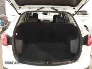 2015 Mazda CX-5 Grand Touring with VIN JM3KE4DY4F0495627, listed as a IAAI auction lot 41887773 with 130,421 mi miles. Bid and sale history available at carsss.com. Image 18.
