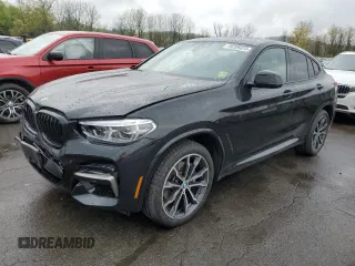 2020 BMW X4 M40i with VIN 5UX2V5C09L9B33814, listed as a Copart auction lot 49206023 with 25,250 mi miles. Bid and sale history available at carsss.com. Image 1.
