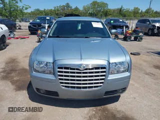 2006 Chrysler 300 Touring with VIN 2C3KA53G56H324954, listed as a IAAI auction lot 42058478 with 124,933 mi miles. Bid and sale history available at carsss.com. Image 12.