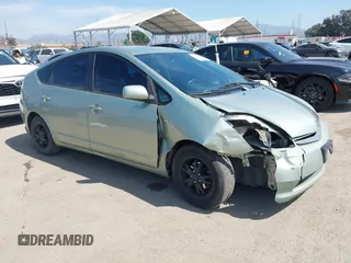 2007 Toyota Prius z VIN JTDKB20U077634962, wystawiony jako IAAI lot #41860612 z przebiegiem 300 541 mil mil oraz . Historia ofert i sprzedaży dostępna na DreamBid. Obrazek 1.