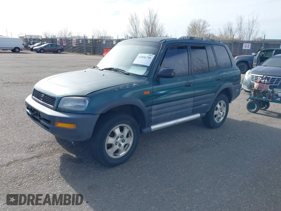 1997 Toyota RAV4 with VIN JT3HP10V2V0147285, listed as a IAAI auction lot 41856796 with 303,535 mi miles and . Bid and sale history available at DreamBid. Image 2.