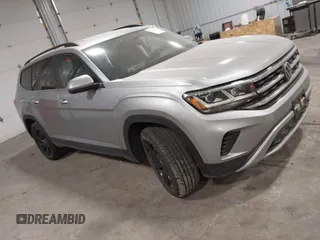 2023 Volkswagen Atlas SE z VIN 1V2HR2CA5PC516757, wystawiony jako IAAI lot #41236062 z przebiegiem 23 485 mil mil oraz . Historia ofert i sprzedaży dostępna na DreamBid. Obrazek 1.