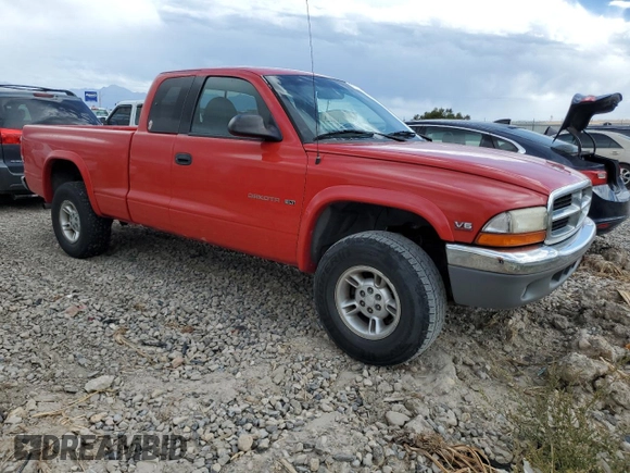 1999 Dodge Dakota SLT with VIN 1B7GG22X7XS101535, listed as a Copart auction lot 71592334 with 151,644 mi miles and Salvage Title. Bid and sale history available at DreamBid. Image 4.