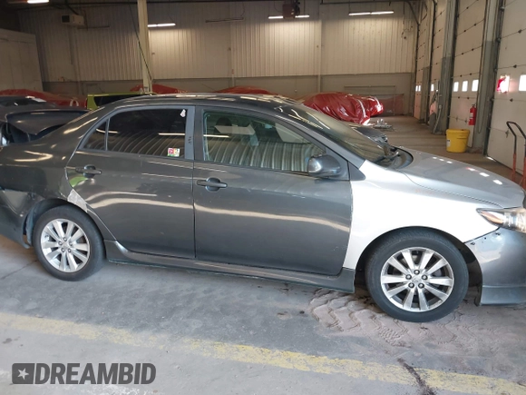 2010 Toyota Corolla with VIN 1NXBU4EE2AZ199308, listed as a IAAI auction lot 42105682 with 206,800 mi miles and . Bid and sale history available at DreamBid. Image 13.