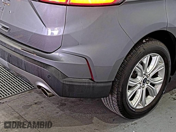 2021 Ford Edge Titanium z VIN 2FMPK3K92MBA53689, wystawiony jako IAAI lot #42501151 z przebiegiem 93 941 mil mil oraz . Historia ofert i sprzedaży dostępna na DreamBid. Obrazek 22.
