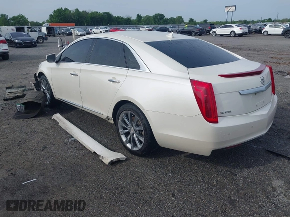 2013 Cadillac XTS with VIN 2G61N5S39D9145885, listed as a IAAI auction lot 42044388 with 181,645 mi miles and . Bid and sale history available at DreamBid. Image 3.