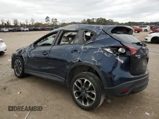 2016 Mazda CX-5 Grand Touring with VIN JM3KE4DY3G0797301, listed as a Copart auction lot 88356205 with Not Provided miles and Non Repairable. Bid and sale history available at carsss.com. Image 2.