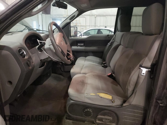 2007 Ford F-150 XLT with VIN 1FTPX14V57FB61439, listed as a Copart auction lot 62274645 with 200,319 mi miles and Salvage title. Bid and sale history available at DreamBid. Image 7.
