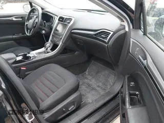 2016 Ford Fusion SE Hybrid with VIN 3FA6P0LU5GR356433, listed as a IAAI auction lot 41799204 with 157,670 mi miles. Bid and sale history available at carsss.com. Image 5.