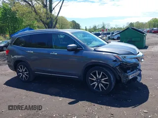 2021 Honda Pilot Touring 8-Passenger z VIN 5FNYF6H9XMB059037, wystawiony jako IAAI lot #42202410 z przebiegiem 49 267 mil mil oraz . Historia ofert i sprzedaży dostępna na DreamBid. Obrazek 13.