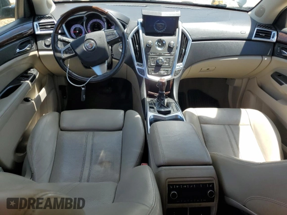 2012 Cadillac SRX Premium Collection with VIN 3GYFNFE32CS549742, listed as a Copart auction lot 63304675 with 114,627 mi miles and Salvage title. Bid and sale history available at DreamBid. Image 8.