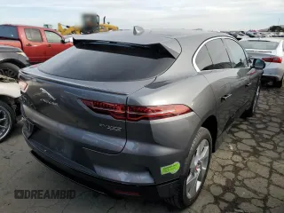 2020 Jaguar I-Pace SE z VIN SADHC2S10L1F83543, wystawiony jako Copart lot #78755163 z przebiegiem 18 792 mil mil oraz . Historia ofert i sprzedaży dostępna na DreamBid. Obrazek 3.