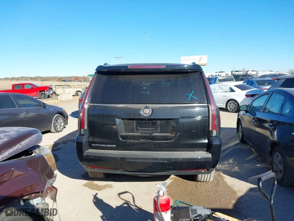 2015 Cadillac Escalade Premium with VIN 1GYS4CKJ0FR180180, listed as a IAAI auction lot 41054933 with 146,974 mi miles. Bid and sale history available at carsss.com. Image 16.
