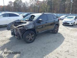 2016 Jeep Cherokee Latitude with VIN 1C4PJMCB1GW343942, listed as a IAAI auction lot 41009555 with 1 mi miles. Bid and sale history available at carsss.com. Image 2.