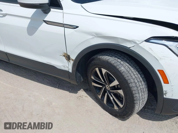 2022 Volkswagen Tiguan S z VIN 3VV1B7AX0NM126321, wystawiony jako IAAI lot #41939646 z przebiegiem 62 309 mil mil oraz . Historia ofert i sprzedaży dostępna na DreamBid. Obrazek 21.