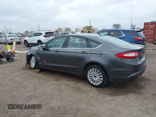 2016 Ford Fusion SE Hybrid with VIN 3FA6P0LU5GR235241, listed as a IAAI auction lot 41697504 with 165,510 mi miles. Bid and sale history available at carsss.com. Image 3.