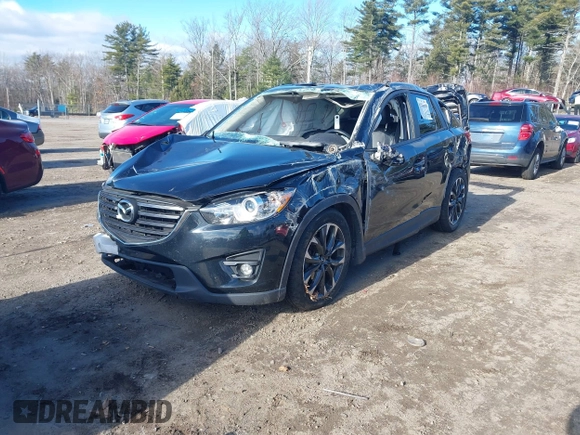 2016 Mazda CX-5 Grand Touring with VIN JM3KE4DY4G0909782, listed as a IAAI auction lot 41006111 with 30,135 mi miles. Bid and sale history available at carsss.com. Image 16.