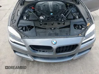 2018 BMW 6 Series 650i z VIN WBA6D4C59JD981398, wystawiony jako Copart lot #53455655 z przebiegiem 19 752 mil mil oraz Szkody całkowita. Historia ofert i sprzedaży dostępna na DreamBid. Obrazek 13.
