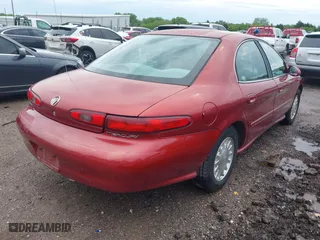 1999 Mercury Sable GS with VIN 1MEFM50UXXA649466, listed as a IAAI auction lot 42094811 with 122,644 mi miles. Bid and sale history available at carsss.com. Image 4.