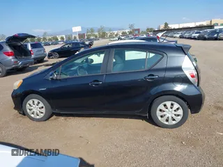 2012 Toyota Prius One with VIN JTDKDTB3XC1504575, listed as a IAAI auction lot 41866455 with 168,254 mi miles and . Bid and sale history available at DreamBid. Image 14.