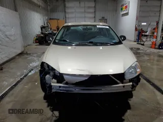 2001 Dodge Stratus z VIN 1B3EJ46XX1N626854, wystawiony jako Copart lot #41568585 z przebiegiem 127 245 mil mil oraz Szkoda całkowita • Salvage title. Historia ofert i sprzedaży dostępna na DreamBid. Obrazek 5.