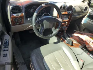 2003 GMC Envoy SLT z VIN 1GKET16S436169701, wystawiony jako Copart lot #44390805 z przebiegiem 168 236 mil mil oraz Szkoda całkowita • Salvage title. Historia ofert i sprzedaży dostępna na DreamBid. Obrazek 8.
