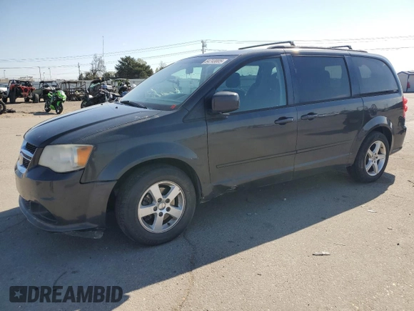 2012 Dodge Grand Caravan SXT with VIN 2C4RDGCG8CR204035, listed as a Copart auction lot 54743005 with 187,533 mi miles and Clean Title. Bid and sale history available at DreamBid. Image 1.