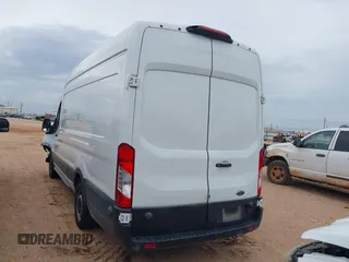 2019 Ford Transit Cargo with VIN 1FTBW3XM8KKA93794, listed as a IAAI auction lot 39696255 with 127,396 mi miles and . Bid and sale history available at DreamBid. Image 3.